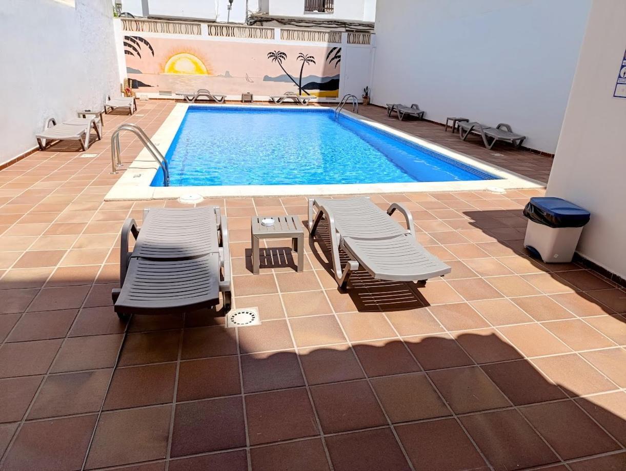 Hostal Horizonte Сан-Антонио-Абад Экстерьер фото A swimming pool