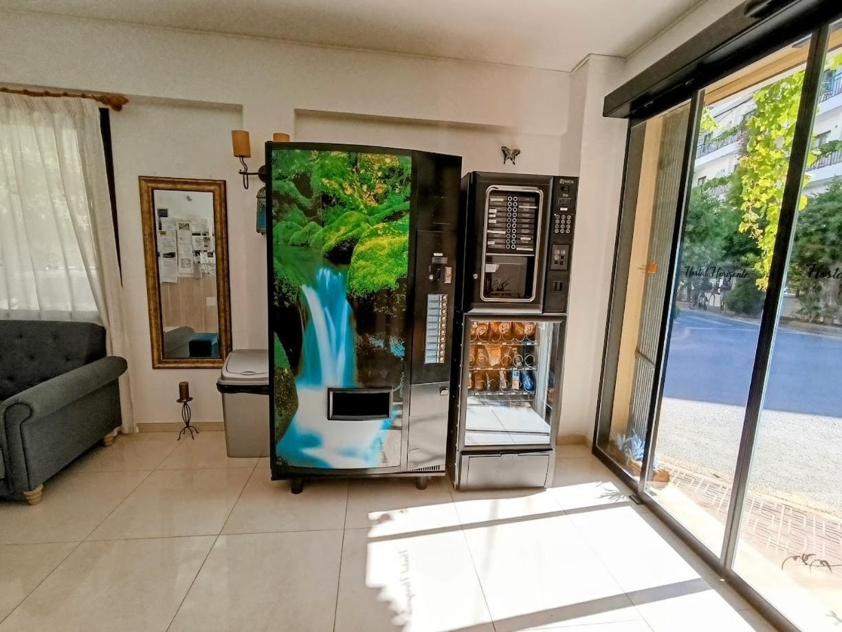Hostal Horizonte Сан-Антонио-Абад Экстерьер фото A vending machine in Greece